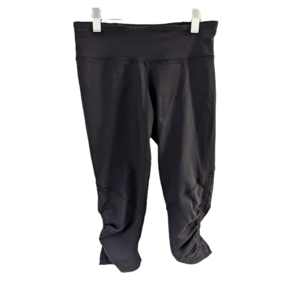 Lululemon Size 6 Ebb to Street Leggings Black Ruched Side Zip Back Pocket
